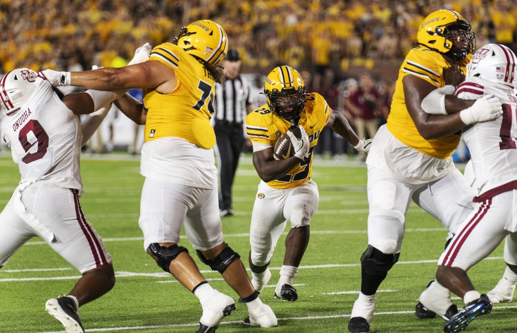 Ahmad Hardy running the football against Massachusetts