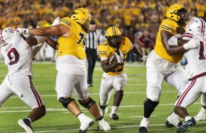 Ahmad Hardy running the football against Massachusetts